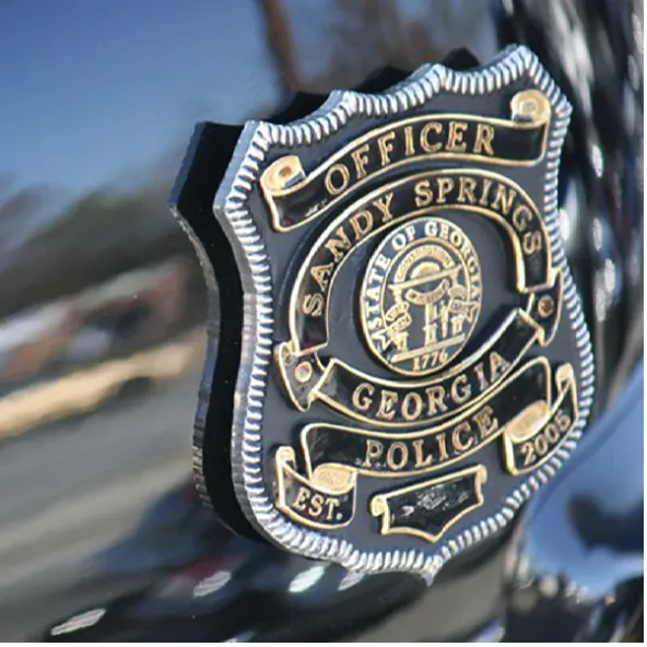 Sandy Springs toddler fatally shot at apartment complex; father charged as investigators examine firearm storage