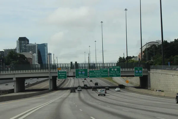 Two separate crashes on 14th Street in Midtown Atlanta damage building near Silver Skillet restaurant