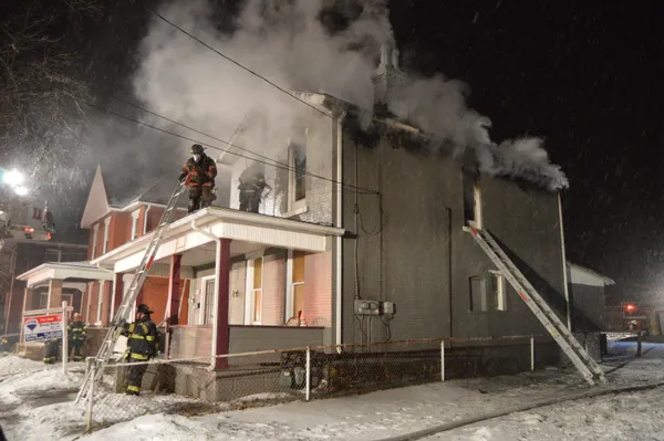 Forest Park firefighters battle Dunwoody Drive house fire as two residents are hospitalized and cause investigated